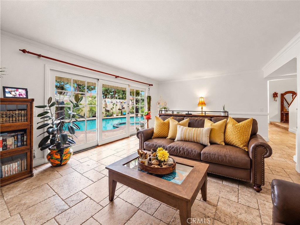 Family Room has Double Wide French Sliders that Open to the Backyard Oasis with Pool and Spa - 622 W Alpine Avenue, Santa Ana CA 92707 - photo 17