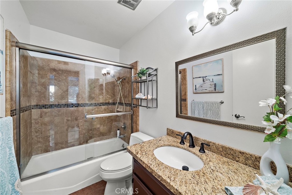 Beautifully Remodeled Upstairs Guest Bathroom with Tub/Shower Combination, Designer Tile Surround, and Clear Glass Enclo - 622 W Alpine Avenue, Santa Ana CA 92707 - photo 32