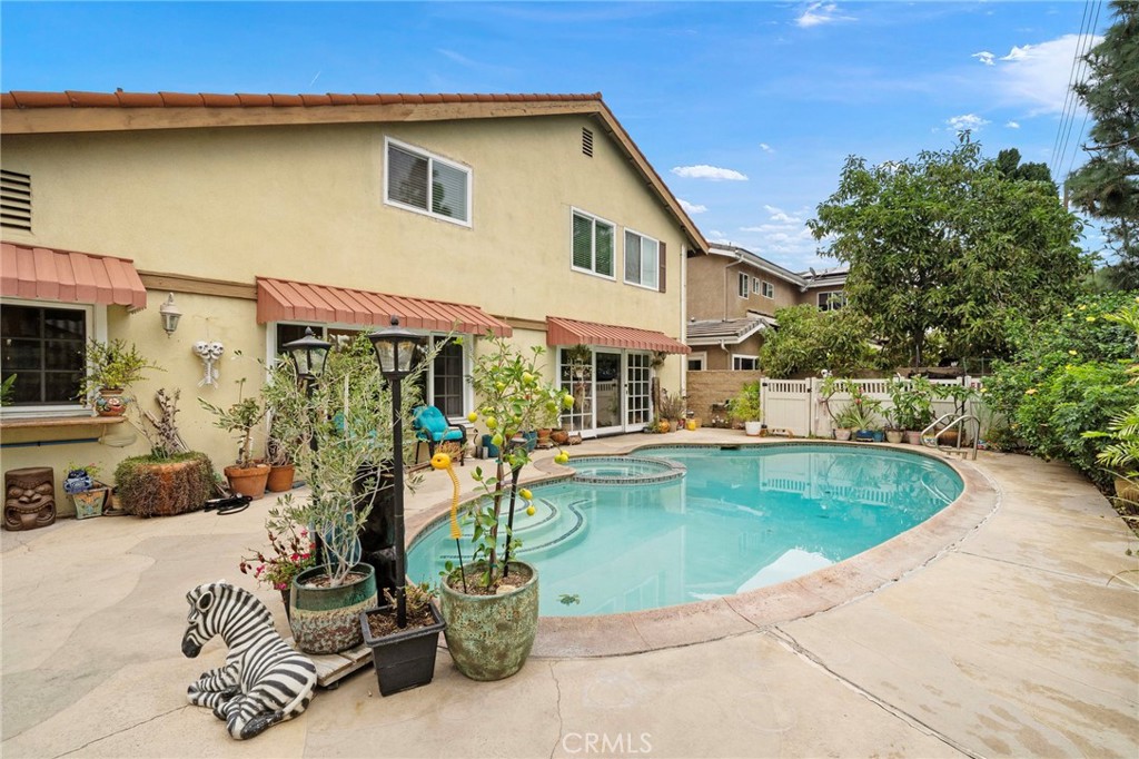 Such a Great Backyard with Pool, Spa, Large Deck Area, Tropical Landscaping, and Awnings for Shade - 622 W Alpine Avenue, Santa Ana CA 92707 - photo 39