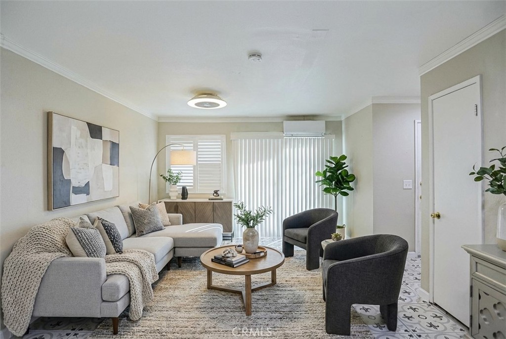 Living room Virtual Staging - 631 N Bristol 62, Santa Ana CA 92703 - photo 1