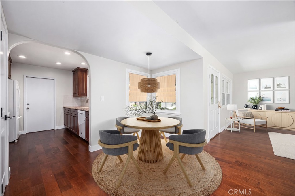 Virtual staged Dinette area features a corner window bringing in light and fresh air. - 1200 Catalina Avenue, Seal Beach CA 90740 - photo 9