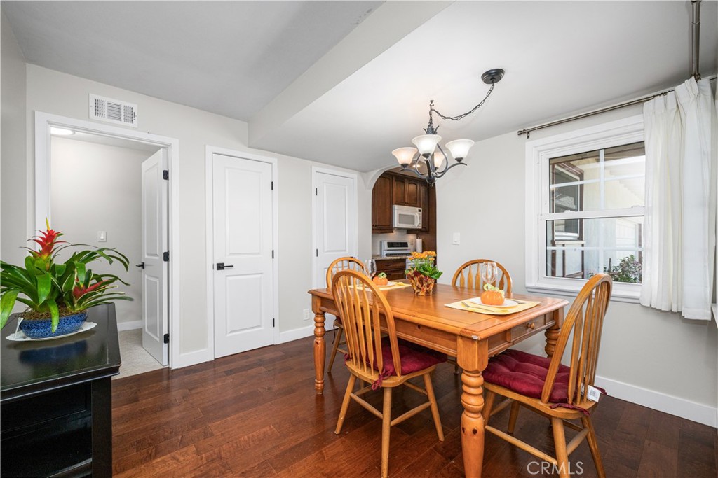This spacious dining area includes a coat closet and a second closet for additional storage. Interior doors and hardware - 1200 Catalina Avenue, Seal Beach CA 90740 - photo 10