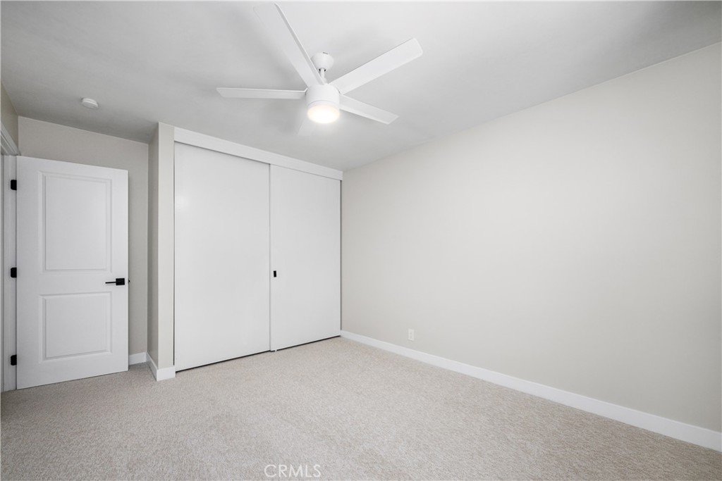 Bedroom 3 Fresh carpet, paint, ceiling fan and door - 1200 Catalina Avenue, Seal Beach CA 90740 - photo 23