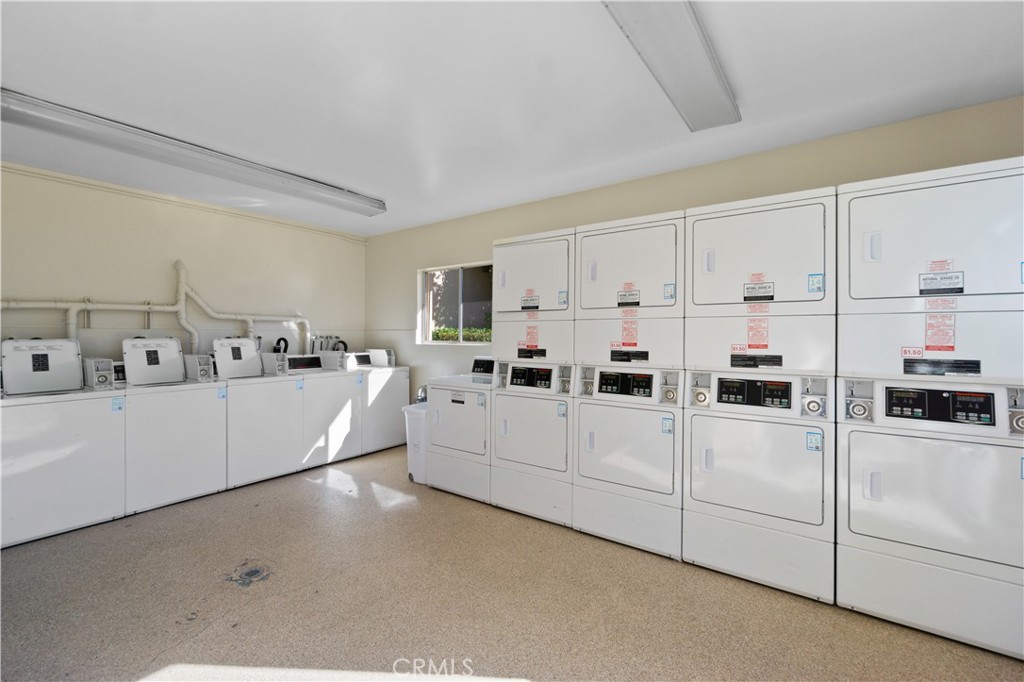 Large community laundry room. - 12200 Montecito Road B112, Seal Beach CA 90740 - photo 26