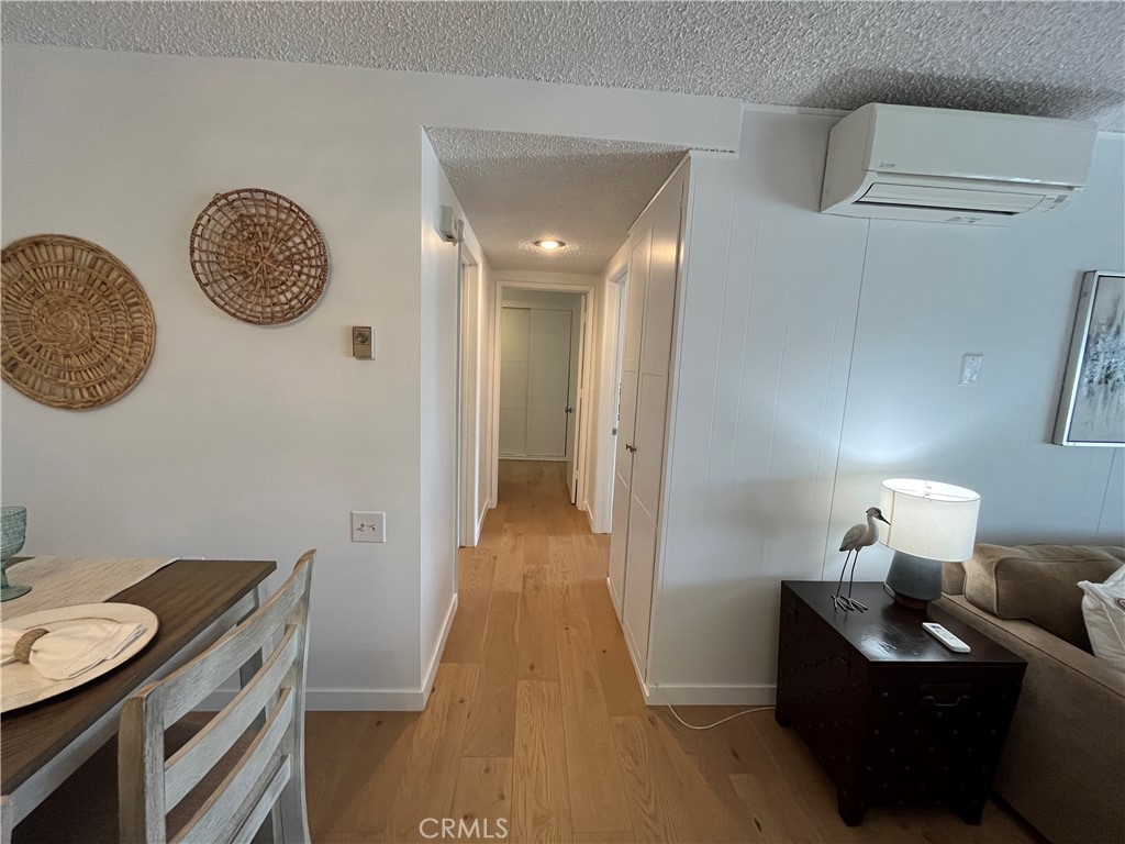 Hall to Primary Suite & 2nd Bedroom - 13200 Del Monte Dr., M15-23N, Seal Beach CA 90740 - photo 11