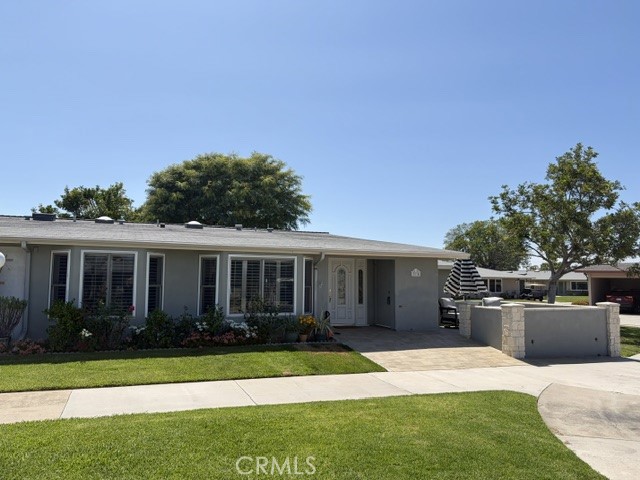 Walk-way without the Golf Cart Pad. - 13251 Del Monte Drive 37-A, Seal Beach CA 90740 - photo 1