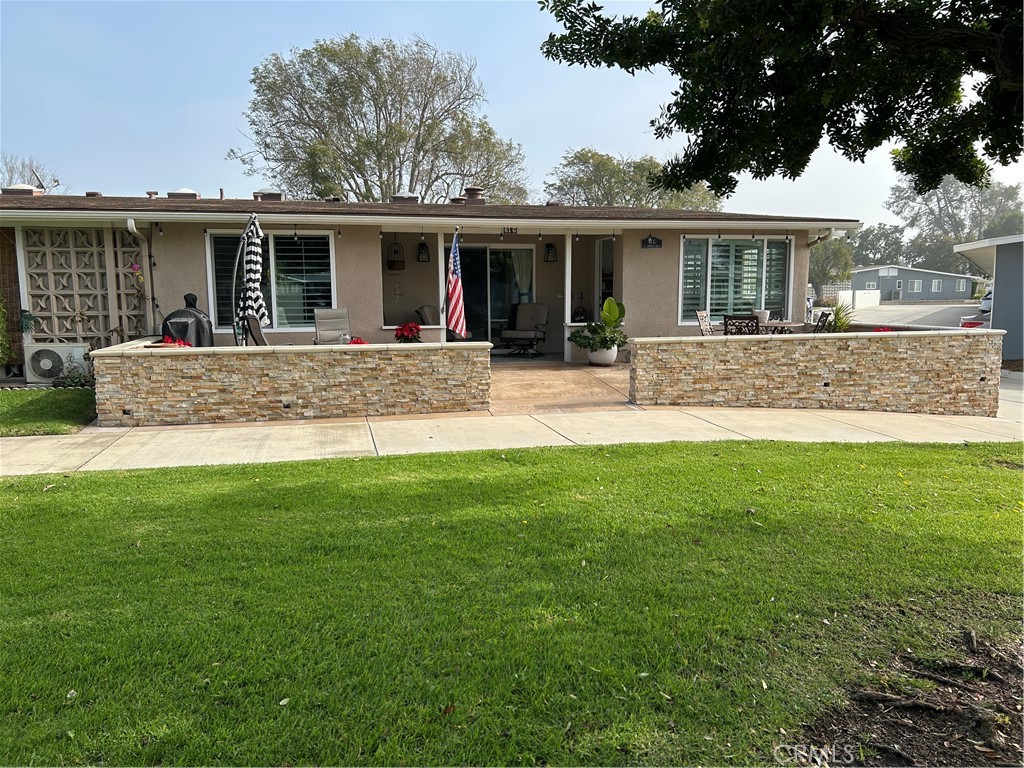 Gorgeous custom patio - 13860 Saint Andrews Drive 61G, Seal Beach CA 90740 - photo 1