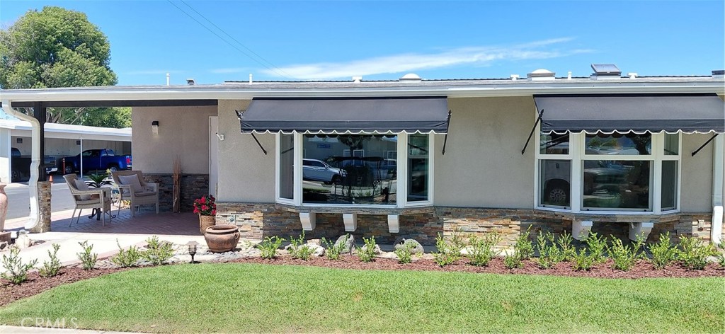luxury living in Leisure World new front windows - 13962 El Dorado Dr M2 60F, Seal Beach CA 90740 - photo 1