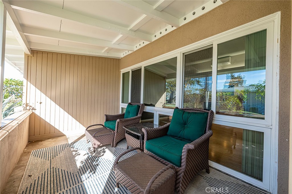 Lovely covered patio for taking in the view - 1441 Homewood Road M5-96C, Seal Beach CA 90740 - photo 2