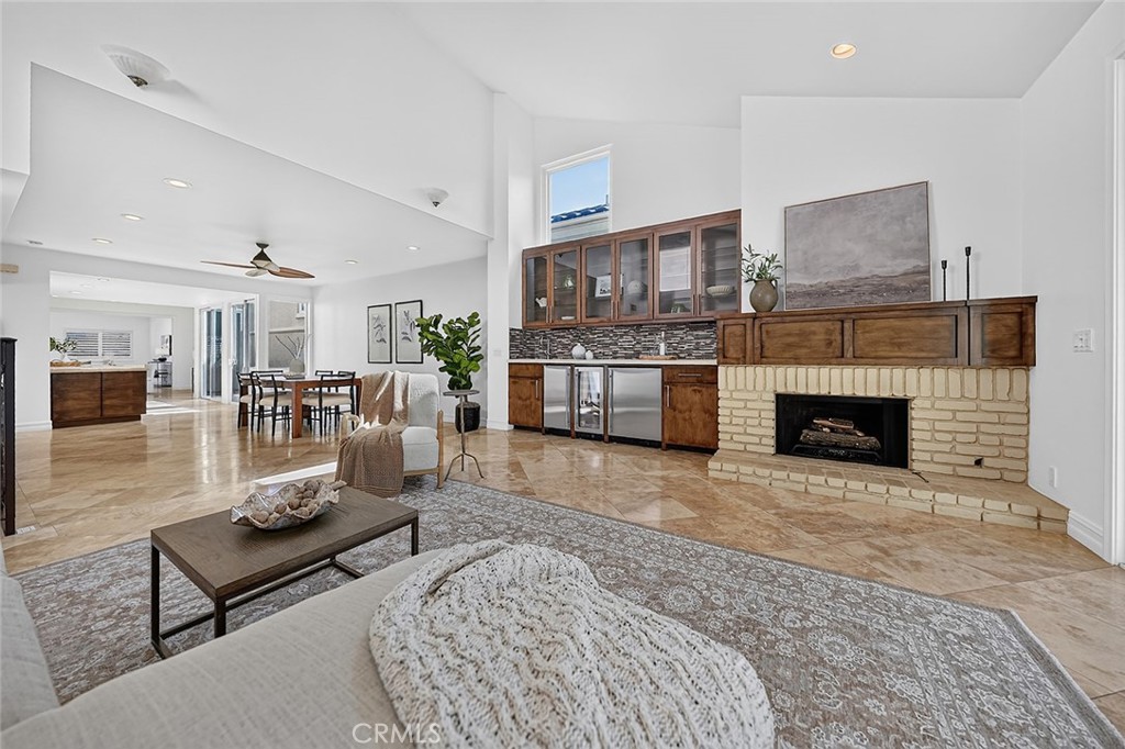 Living room offers fireplace and wet bar - 154 12th, Seal Beach CA 90740 - photo 2