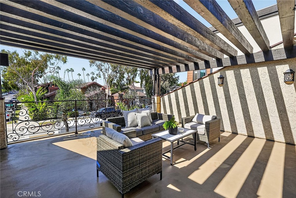 Patio off the front living room becomes an extension of your living space with an indoor outdoor feel - 154 12th, Seal Beach CA 90740 - photo 6