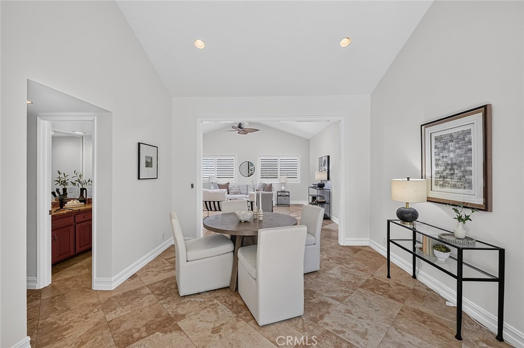 Breakfast room leads to upstairs powder room - 154 12th, Seal Beach CA 90740 - photo 11