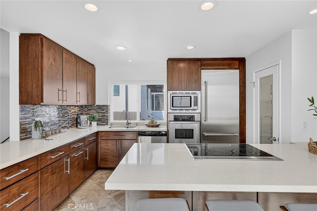 The kitchen becomes the heart of the house - 154 12th, Seal Beach CA 90740 - photo 16