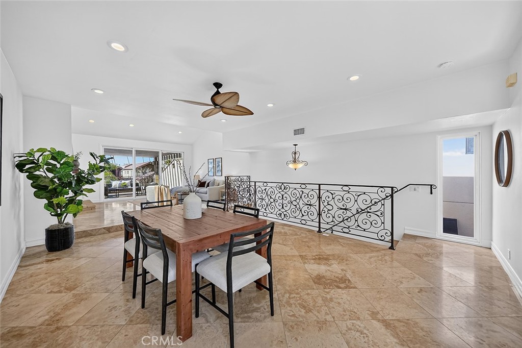 The house is a reverse floor plan so join us downstairs - 154 12th, Seal Beach CA 90740 - photo 22
