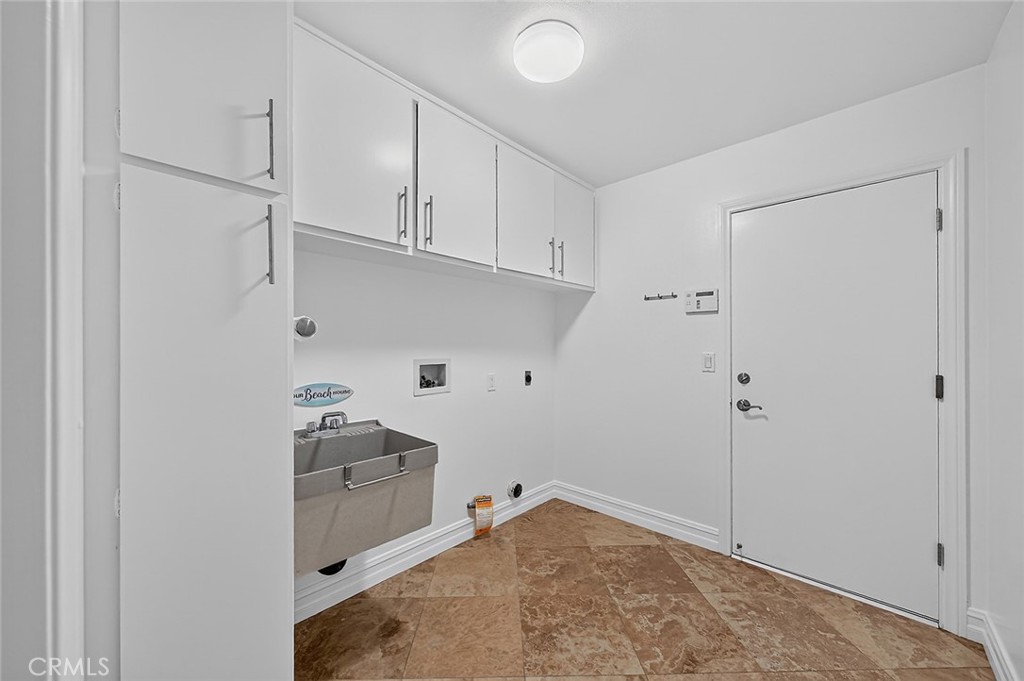 Laundry area which then leads to two car garage - 154 12th, Seal Beach CA 90740 - photo 30