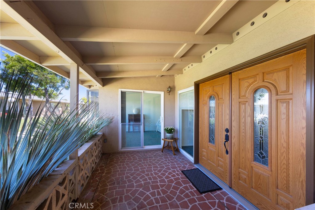 Patio at entrance - 1701 Tam O'Shanter Drive 11K, Seal Beach CA 90740 - photo 1