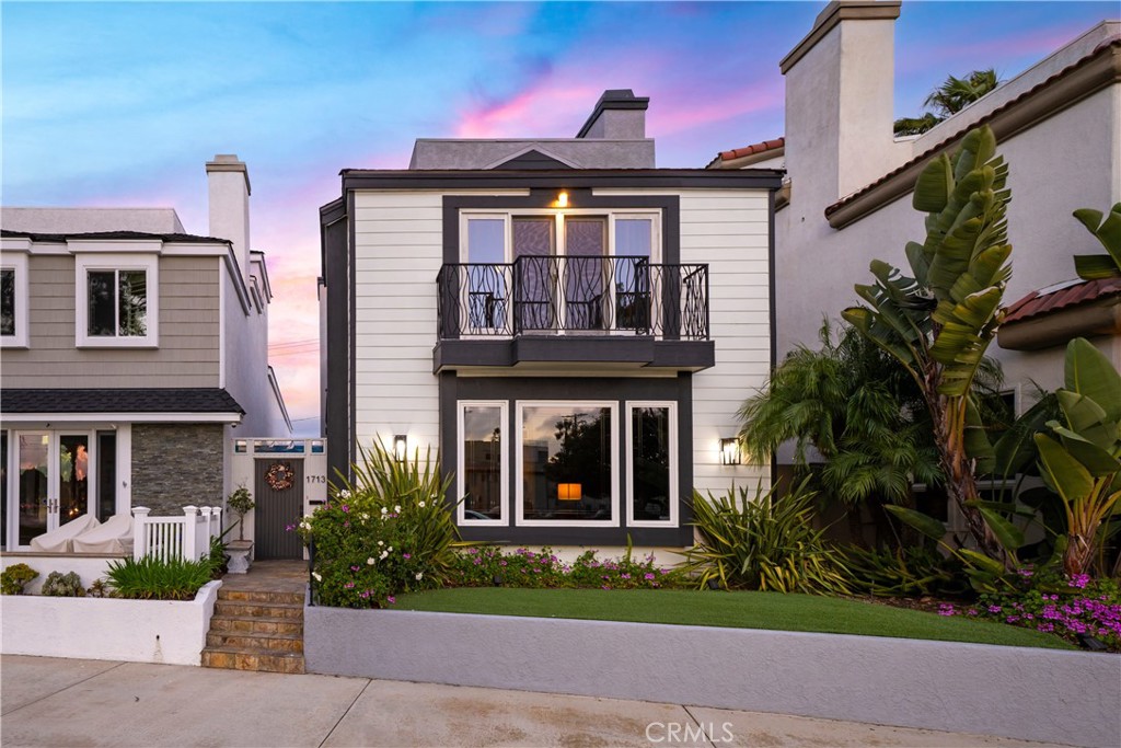 Front of home oriented positioned to capture ocean breezes and natural light. - 1713 Electric Avenue, Seal Beach CA 90740 - photo 1