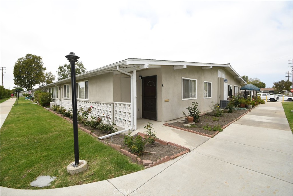 Walk way to three churches - 1842 Thunderbird Drive 1A, Seal Beach CA 90740 - photo 1