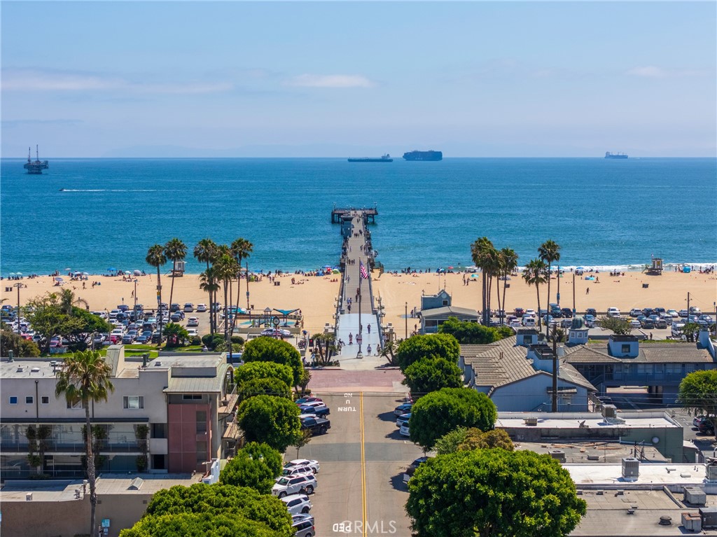 Drive Home to view the Beautiful Seal Beach Pier, make a sharp right on to 805 Ocean Ave. where the Beach is steps away - 805 Ocean Avenue 6, Seal Beach CA 90740 - photo 1