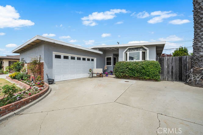 Perfectly located on The Hill in a quiet location. Drive way is perfect for parking an RV, boat or extra toys. - 815 Marvista Avenue S, Seal Beach CA 90740 - photo 1