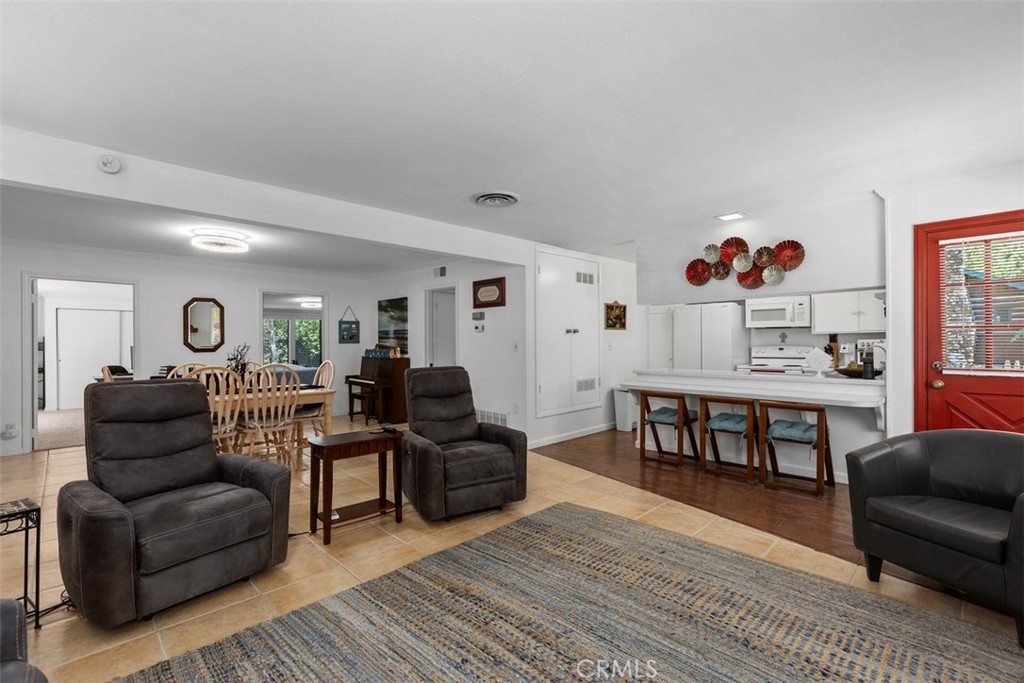 Living room looking towards Dining, kitchen & 2 of the bedrooms & 1 bath - 29501 Silverado Canyon Road, Silverado Canyon CA 92676 - photo 13