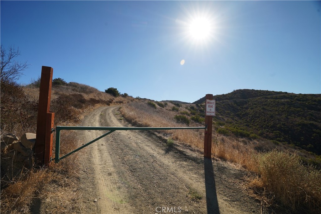 This property is BEHIND this locked gate. Walk about 5 minutes past this gate. - 16 Williams Canyon, Silverado CA 92676 - photo 14