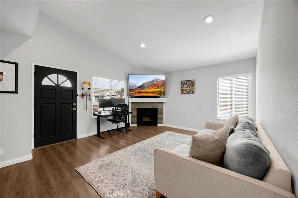 Living room - 10411 E Briar Oaks, Stanton CA 90680 - photo 3