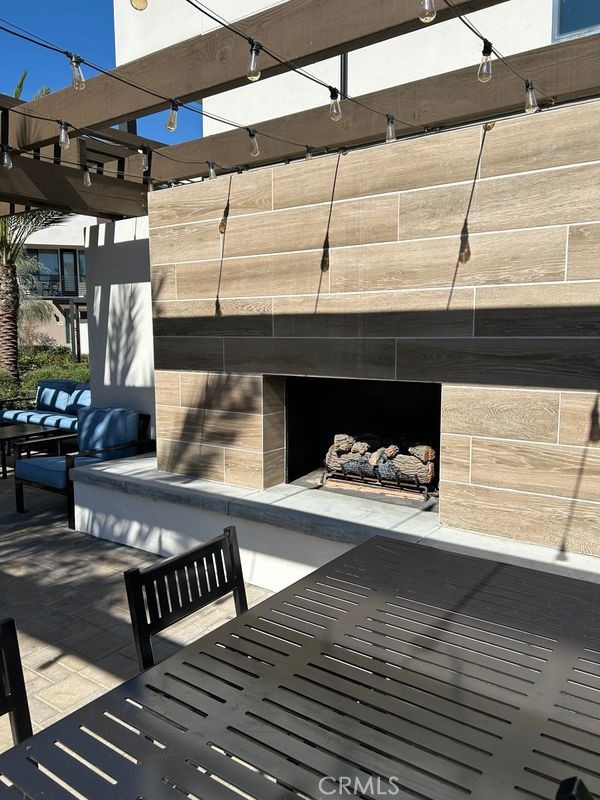 covered outside fireplace - 19 Bigsby Drive, Stanton CA 90680 - photo 8