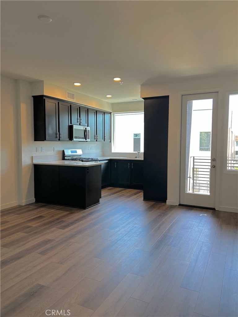 Great room - 20 Bigsby Drive, Stanton CA 90680 - photo 12