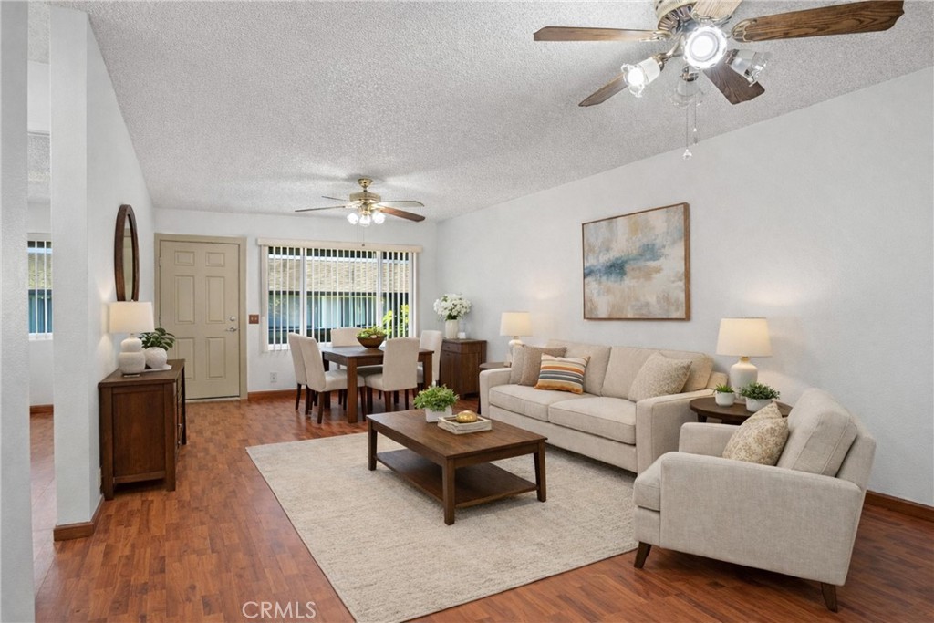 Living room virtually staged - 7100 Cerritos Avenue 86, Stanton CA 90680 - photo 1