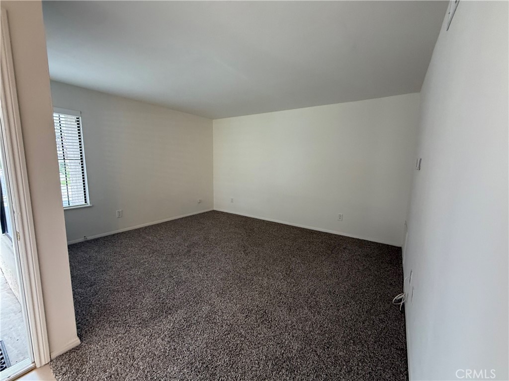 7735 Briarglen Loop A, Stanton CA 90680 - photo 1