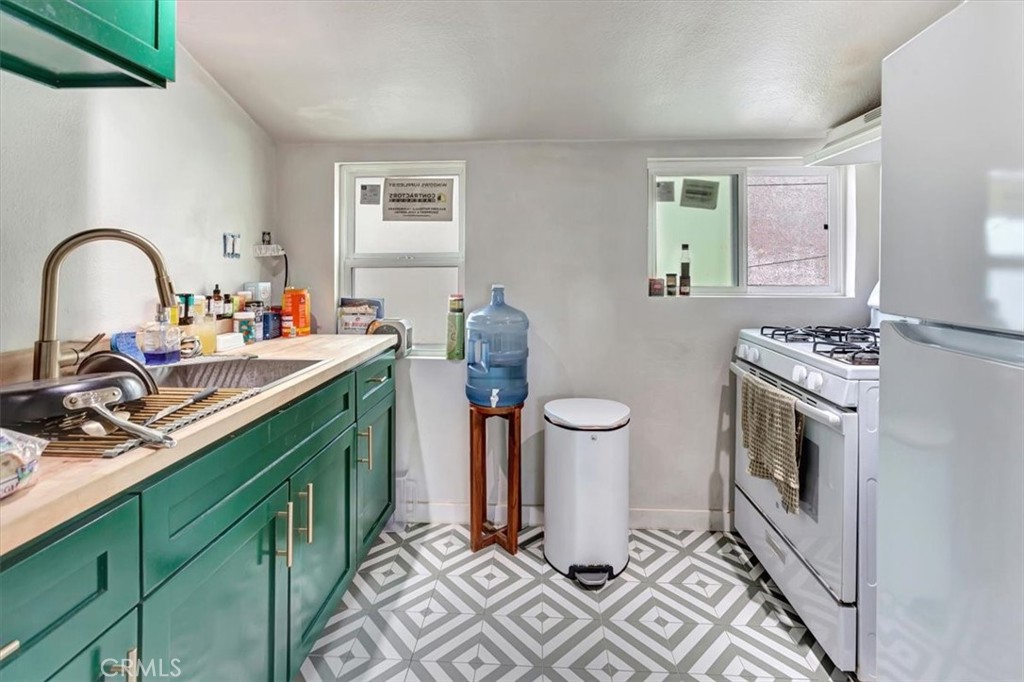 Upper Rear Unit Kitchen - 16432 25th Street, Sunset Beach CA 90742 - photo 12