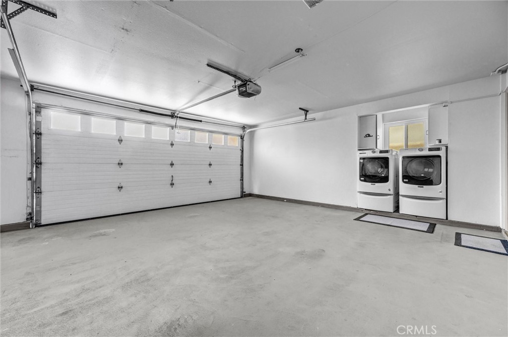 2 car garage with Laundry - 17081 5th, Sunset Beach CA 90742 - photo 35