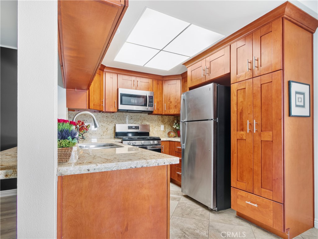 Skylight in kitchen adds additional light and warmth. - 1159 E 1st, Tustin CA 92780 - photo 5