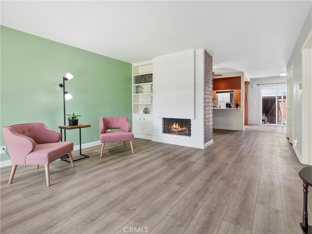 Semi-open floorplan with high-engineered wood laminate flooring - 1159 E 1st, Tustin CA 92780 - photo 11