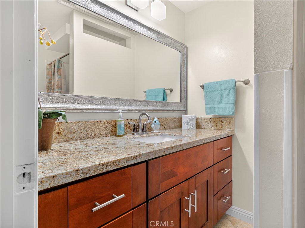 Master Bedroom with newer vaniety and granite cabinets, designer touches - 1159 E 1st, Tustin CA 92780 - photo 22