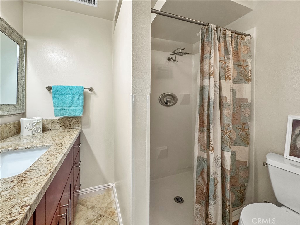 (view of walk-in shower, wheel-chair accessible) - 1159 E 1st, Tustin CA 92780 - photo 25