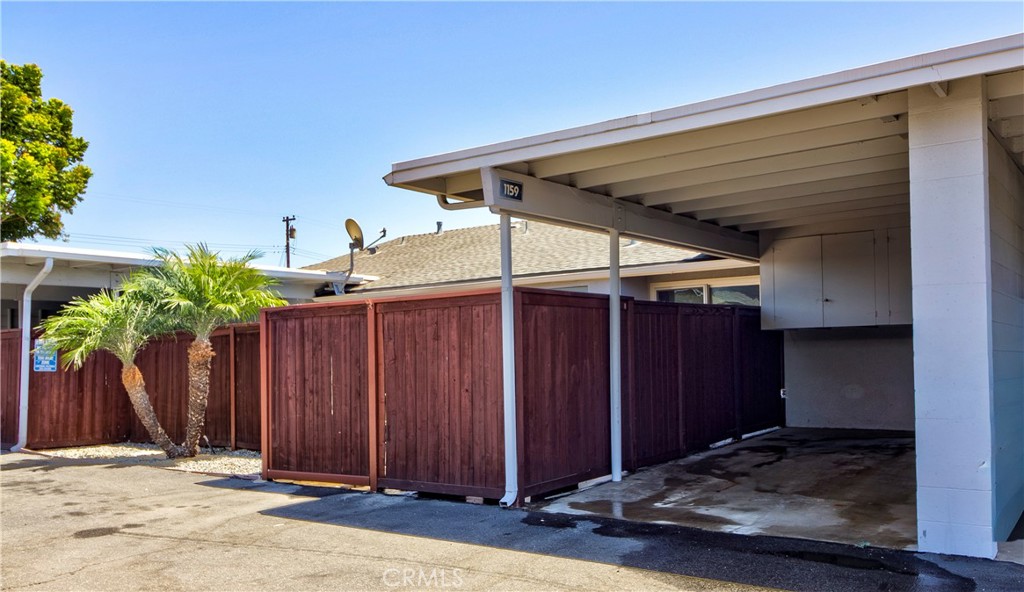 Secured covered parking space/Carport with cabinets, and gate into Patio - 1159 E 1st, Tustin CA 92780 - photo 30