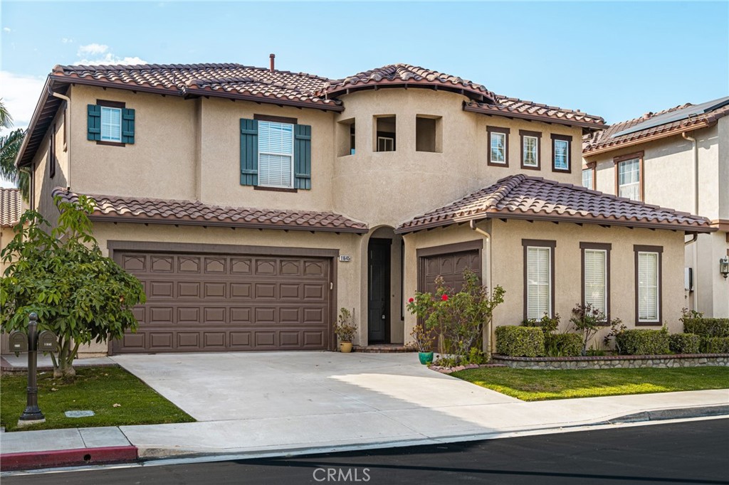 Great curb appeal, 3 car garage - 11645 Maynard Avenue, Tustin CA 92782 - photo 1