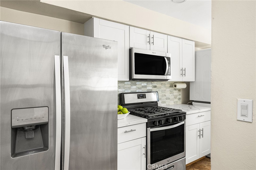 Spacious kitchen with lots of storage - 1192 Mitchell Avenue 42, Tustin CA 92780 - photo 9