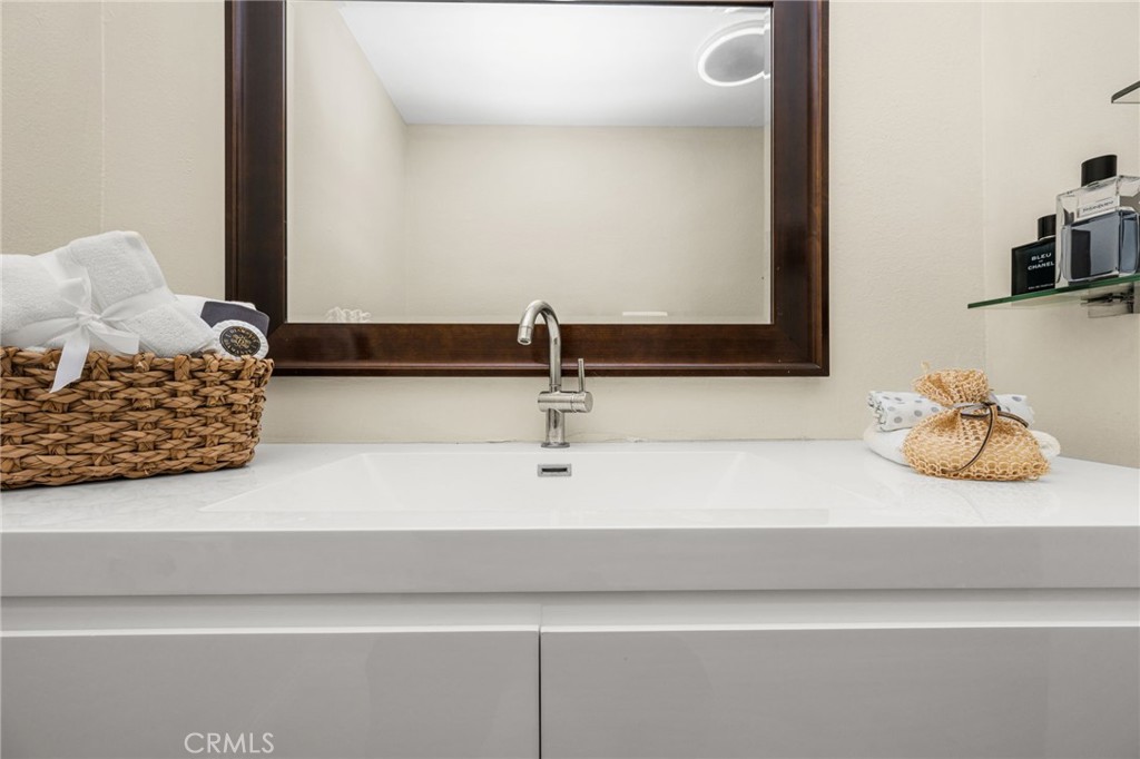 Remodeled Primary bathroom with floating vaniity - 1192 Mitchell Avenue 42, Tustin CA 92780 - photo 21