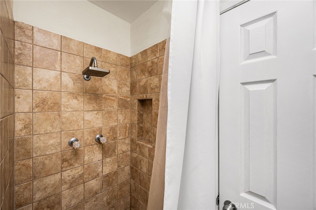Primary bathroom with large walk in shower - 1192 Mitchell Avenue 42, Tustin CA 92780 - photo 24