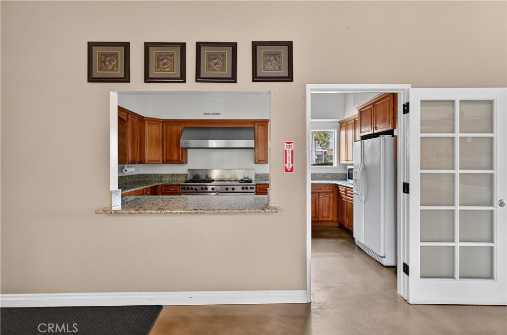 Community Hall kitchen - 123 Madrid, Tustin CA 92780 - photo 35