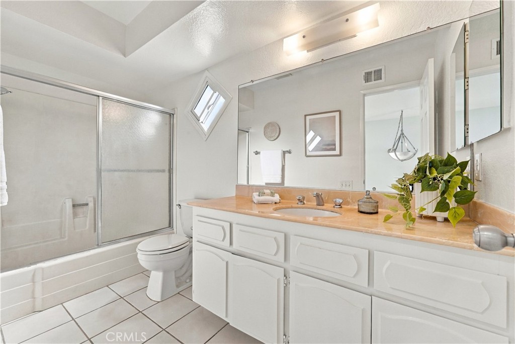Upstairs hall bathroom, tub shower combo - 12620 Newport Avenue, Tustin CA 92780 - photo 19