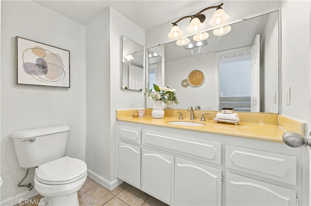 Lower level half. bath - 12620 Newport Avenue, Tustin CA 92780 - photo 22