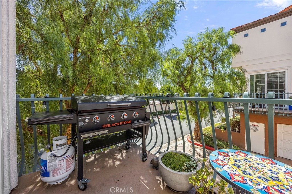 LIVING ROOM BALCONY - 12703 Trent Jones Lane, Tustin CA 92782 - photo 11