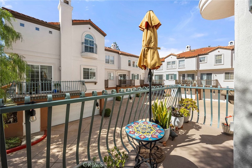 LIVING ROOM BALCONY - 12703 Trent Jones Lane, Tustin CA 92782 - photo 12