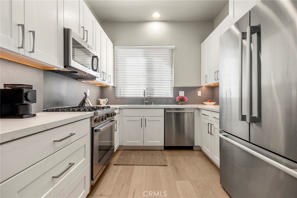 KITCHEN - 12703 Trent Jones Lane, Tustin CA 92782 - photo 15
