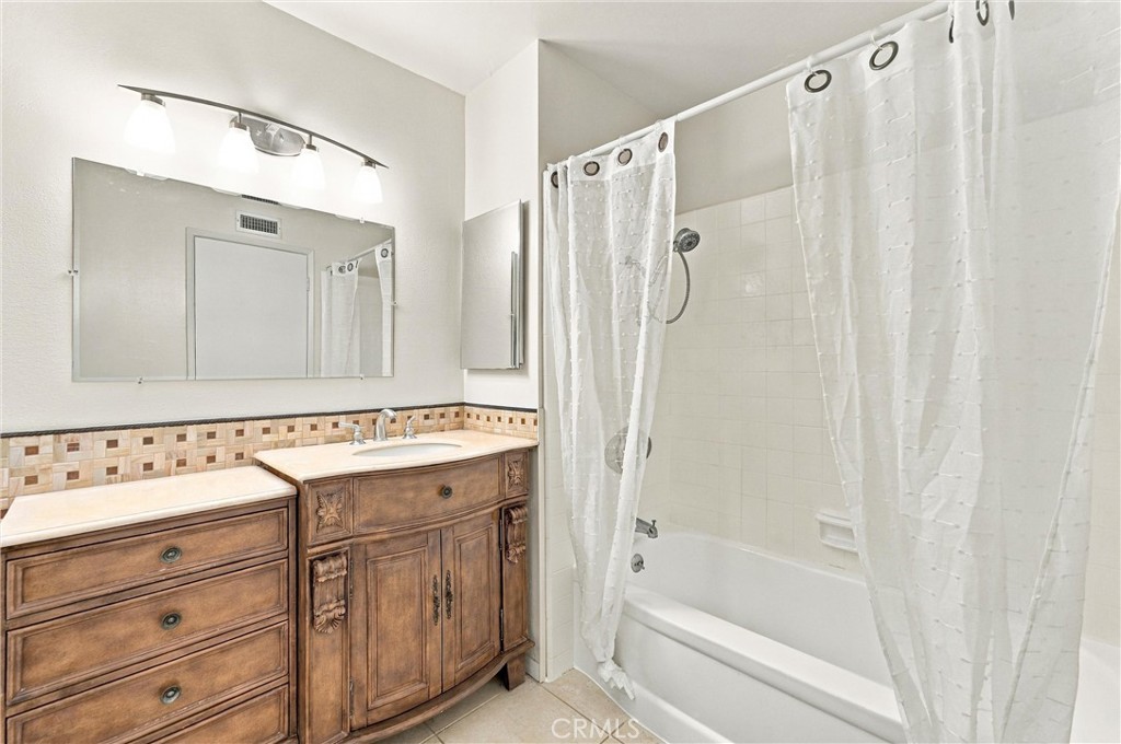 Downstairs Hall/Guest Bathroom - 13431 Epping Way, Tustin CA 92780 - photo 22
