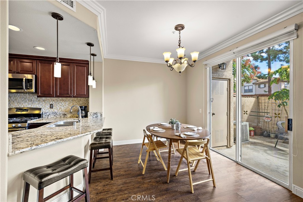 Dining room and kitchen bar seating - 13462 Savanna, Tustin CA 92782 - photo 10